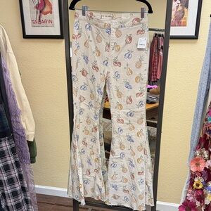 We The Free Cream Fruit float on Flare Jeans